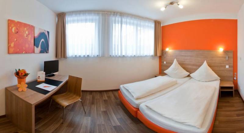 Orange Hotel und Apartments